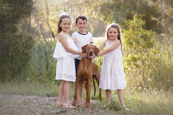 children with their dog